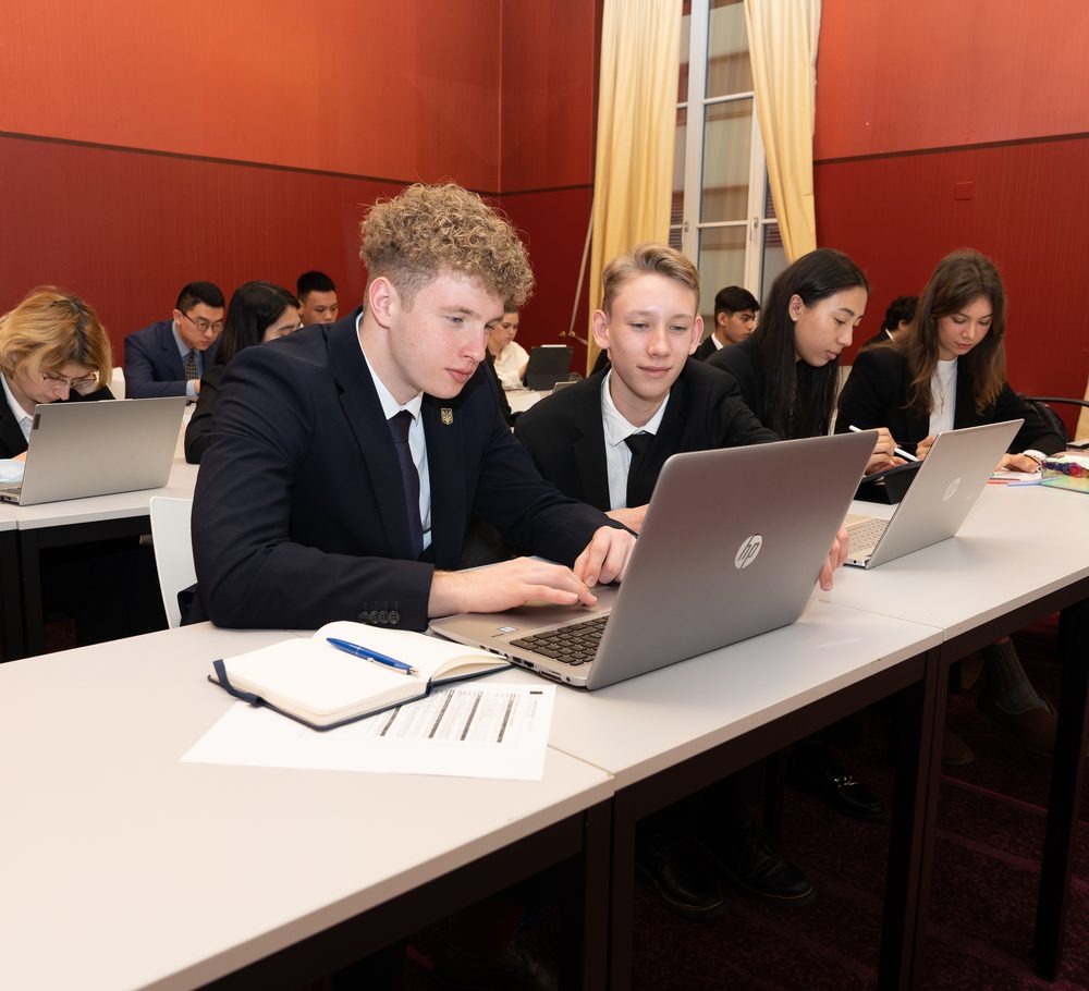 Hospitality students working in a BHMS classroom in Lucerne